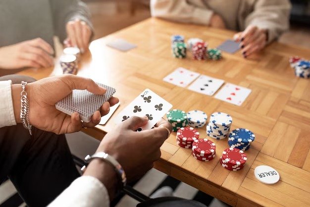 Live dealer gambling table with multiple players